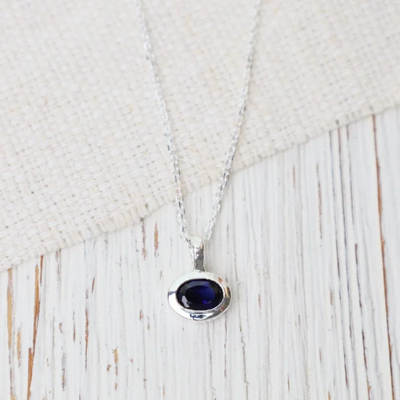 Bezel Set Oval Synthetic Sapphire Pendant Necklace