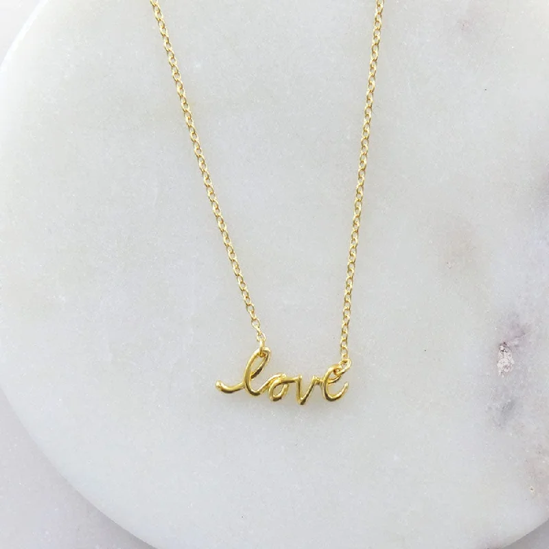 MINI CURSIVE "LOVE" NECKLACE IN GOLD VERMILE